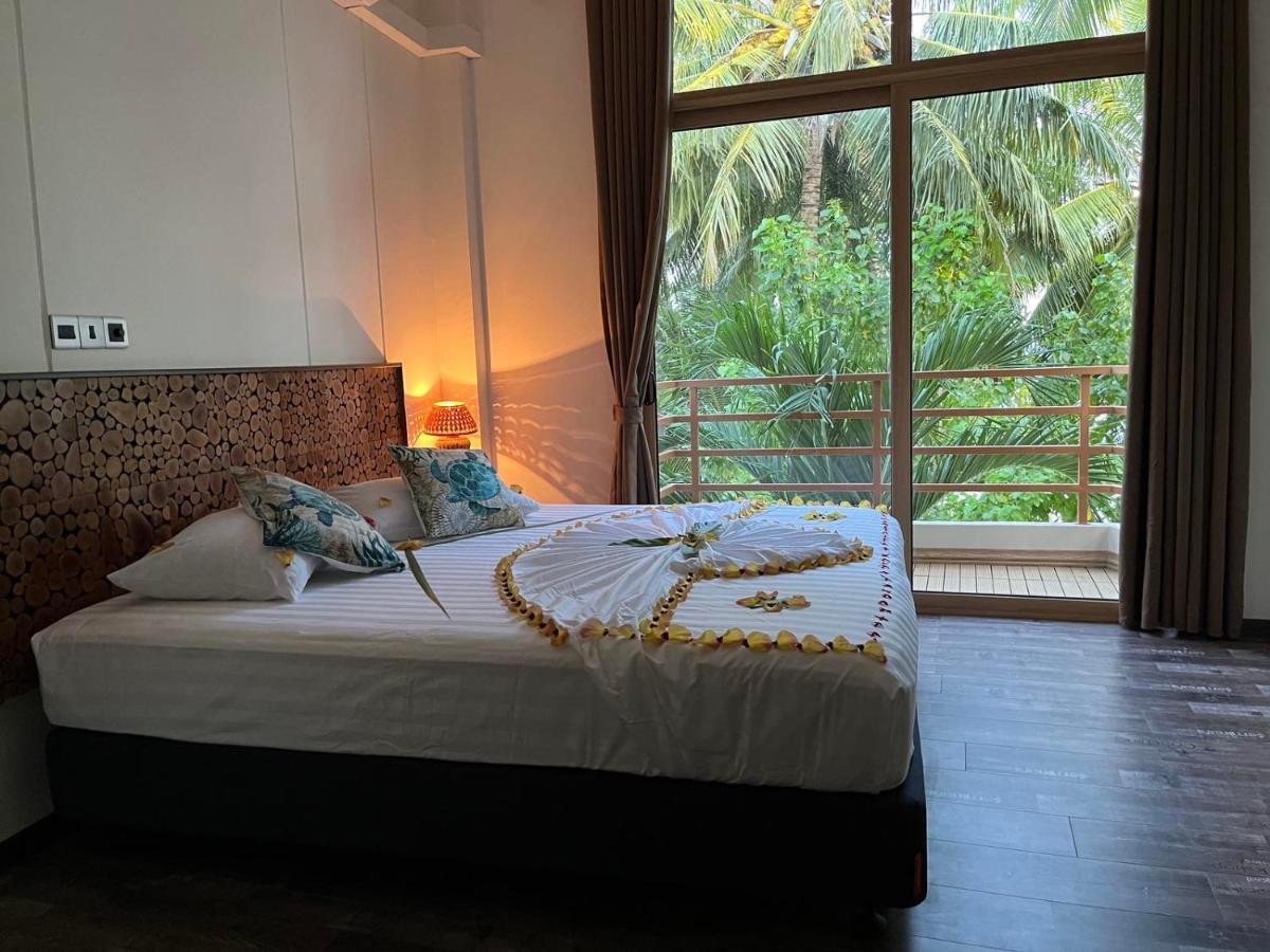 Finolhu Beach Guest House Фелиду Екстериор снимка